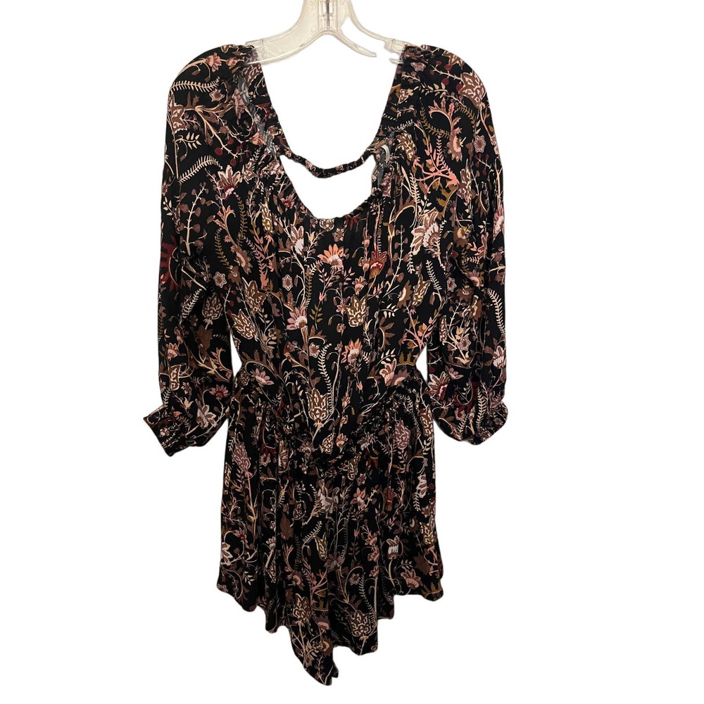Free People floral print back cut out , off the shoulder romper size large..